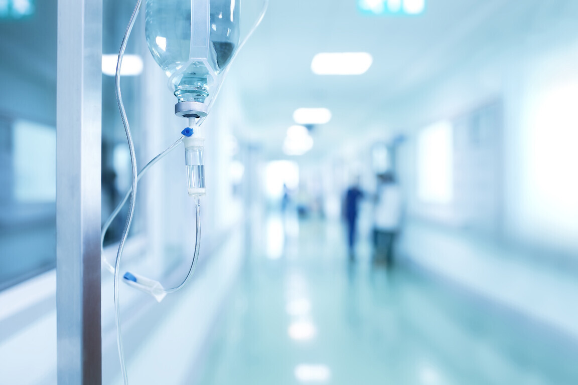 Medical drip in hospital corridor, concept of treatment