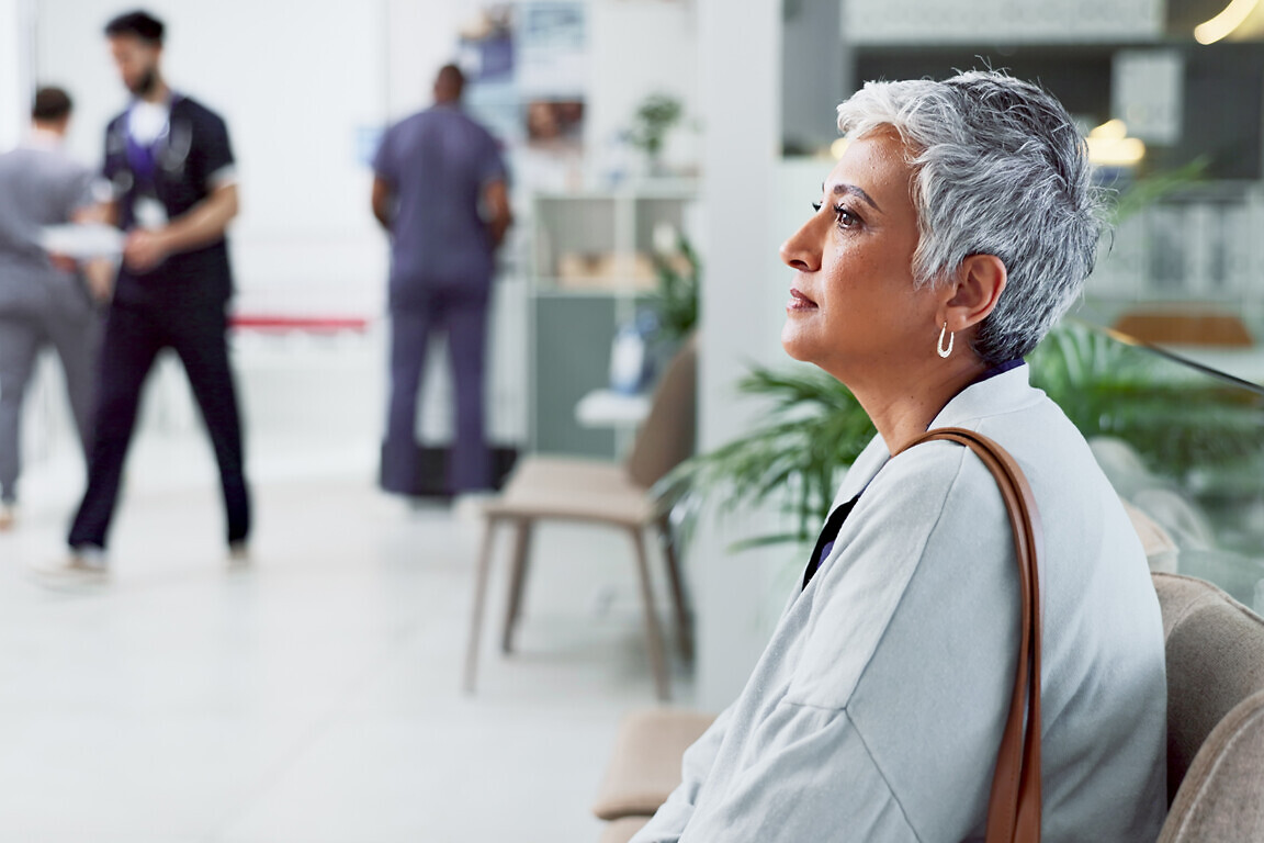 Thinking, waiting and senior woman in hospital, medical and calm with healthcare. Thoughts, mature person and lady in clinic, anxiety and wonder with decision, choice and peace with break.