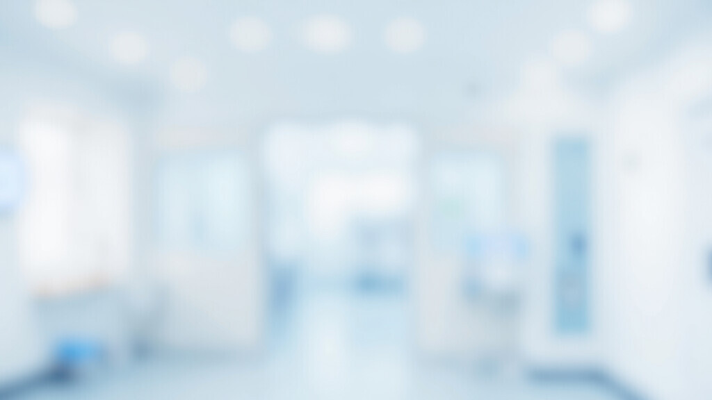 Blurred hospital interior background, modern clinic hallway with bright light, soft white walls, clean medical environment, empty corridor, blurry medical, professional clinic interior