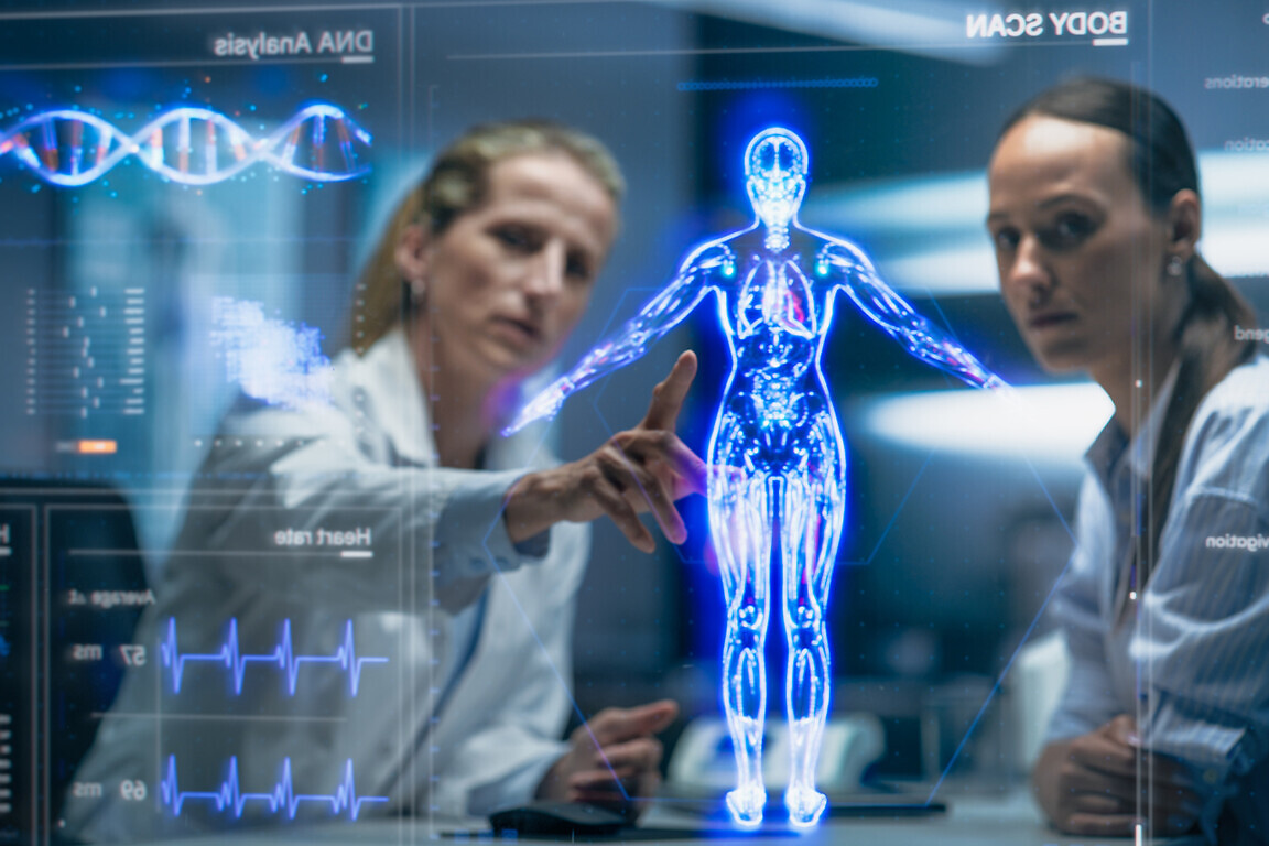 Physician and Patient Analyze a Holographic Body Model.