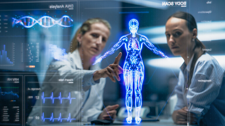 Physician and Patient Analyze a Holographic Body Model.