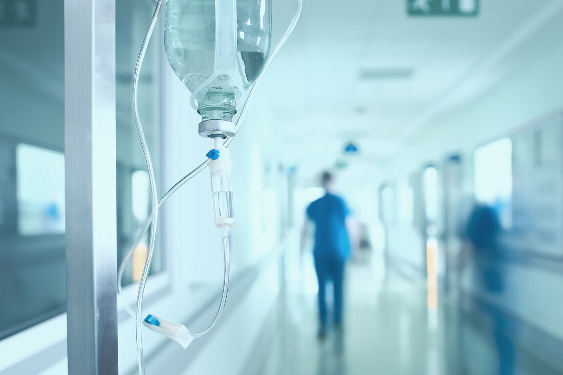 Silhouette of a doctor walking.