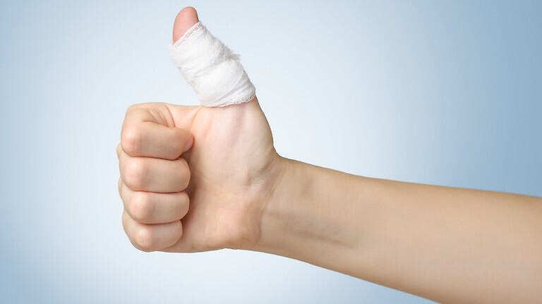 Injured finger with bandage