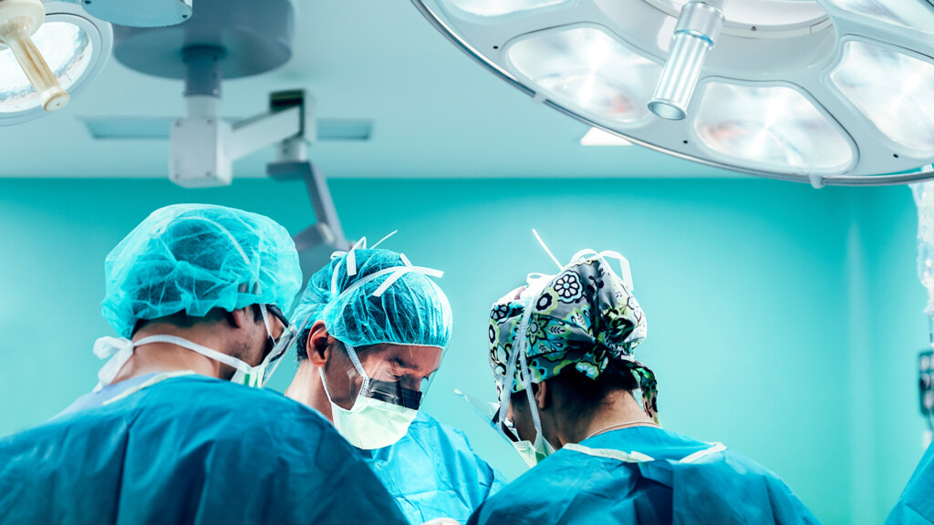 Team of Surgeons Operating
