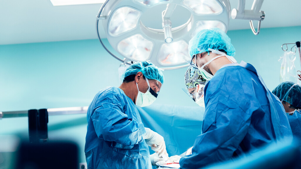 Team of Surgeons Operating