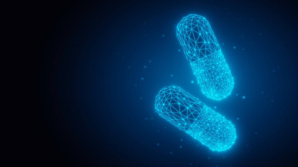 Two blue glowing low-poly wireframe pills or medical capsules on