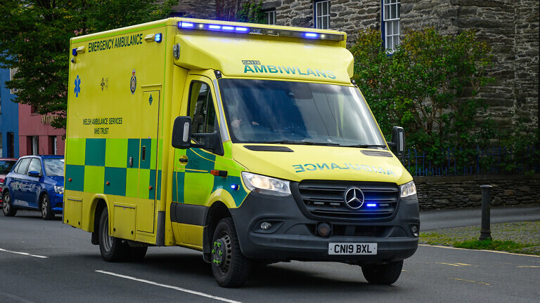 Welsh Ambulance Services NHS Trust vehicle responding with blue