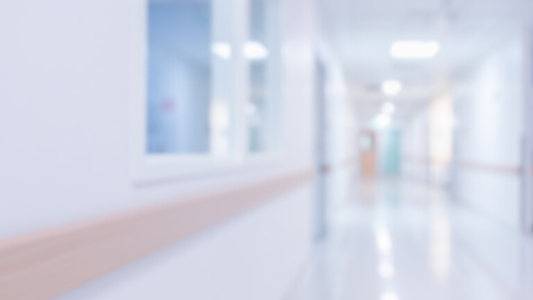 Blurred corridor of a modern clinic.