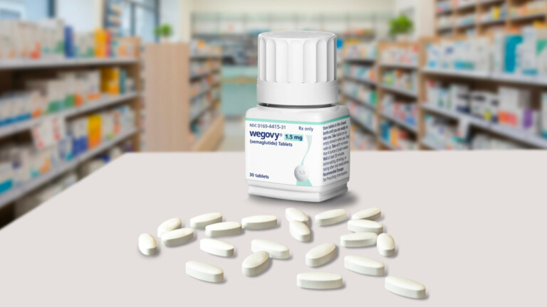 Medicine container bottle with weight-loss drug Wegovy tablet pills from Novo Nordisk inside a blurred pharmacy.
