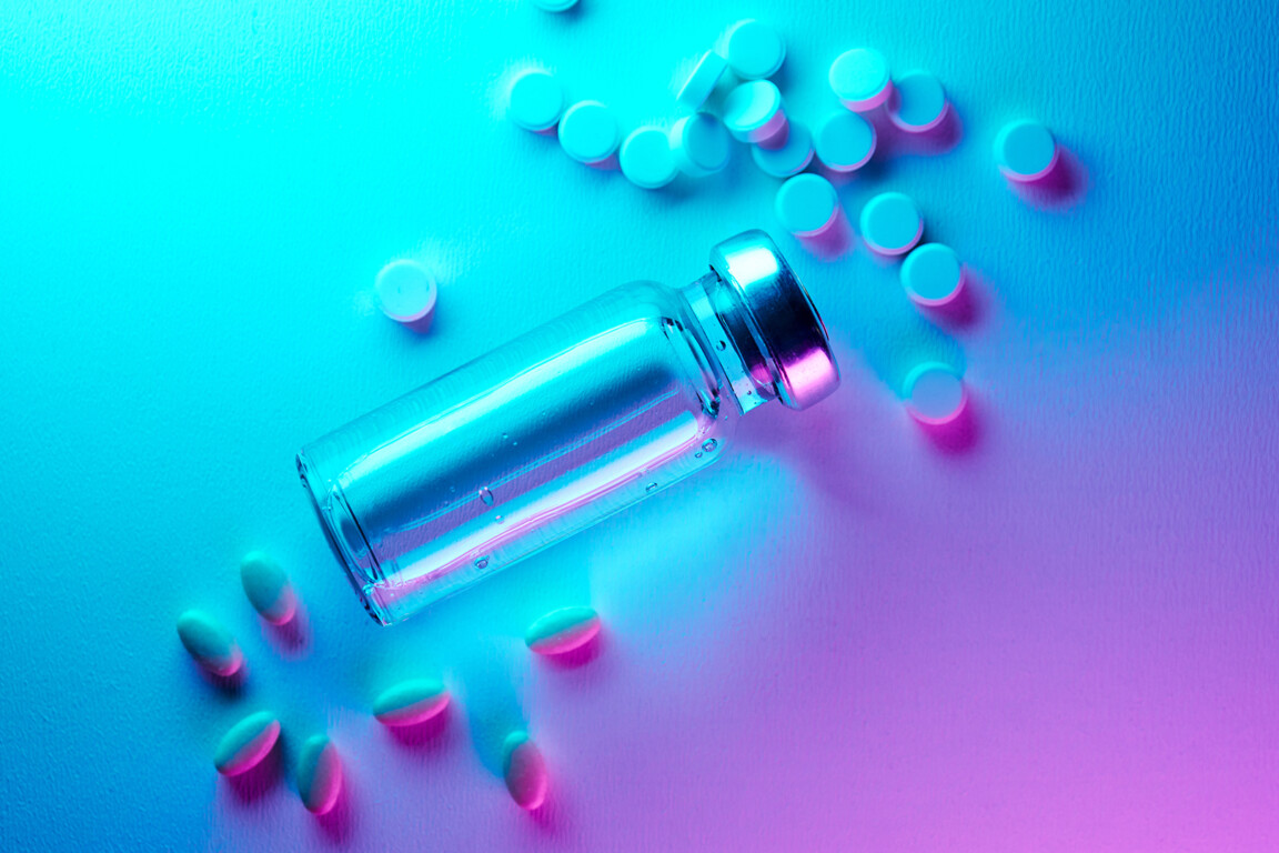 Glp 1 medication vial and pills
