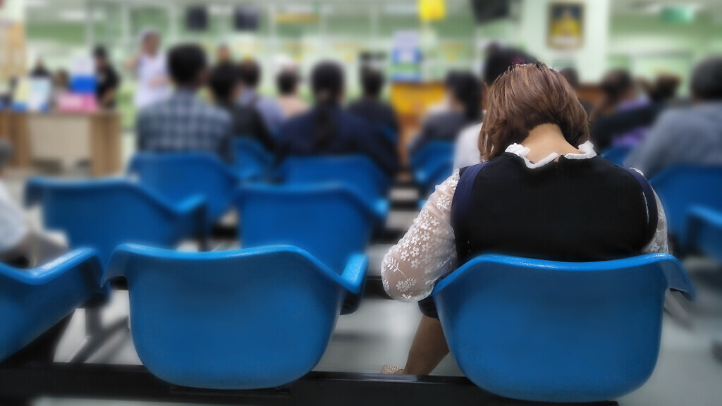 many people waiting medical and health services to the hospital,patients waiting treatment at the hospital,blurred image of people