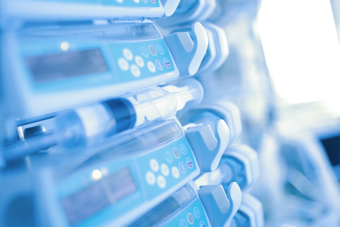 Electronic drug perfusion system (syringe pump) in the modern equipped critical care unit.
