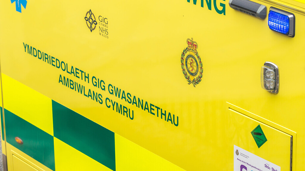 Detail of the side of a Welsh ambulance.