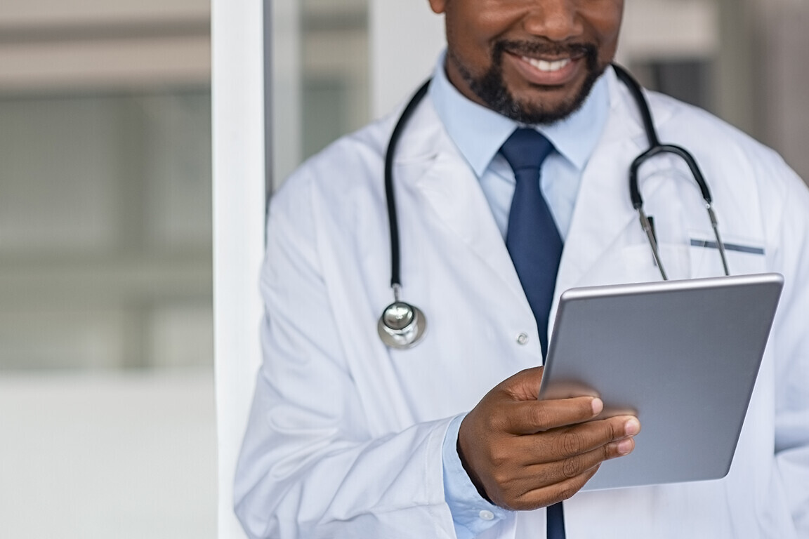 Doctor reading medical report