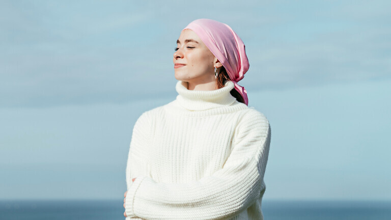Portrait of young woman with cancer