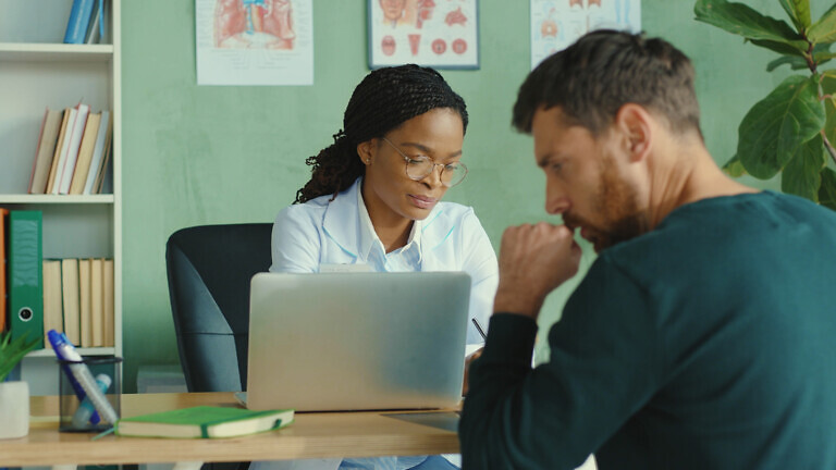 Doctor consulting a patient
