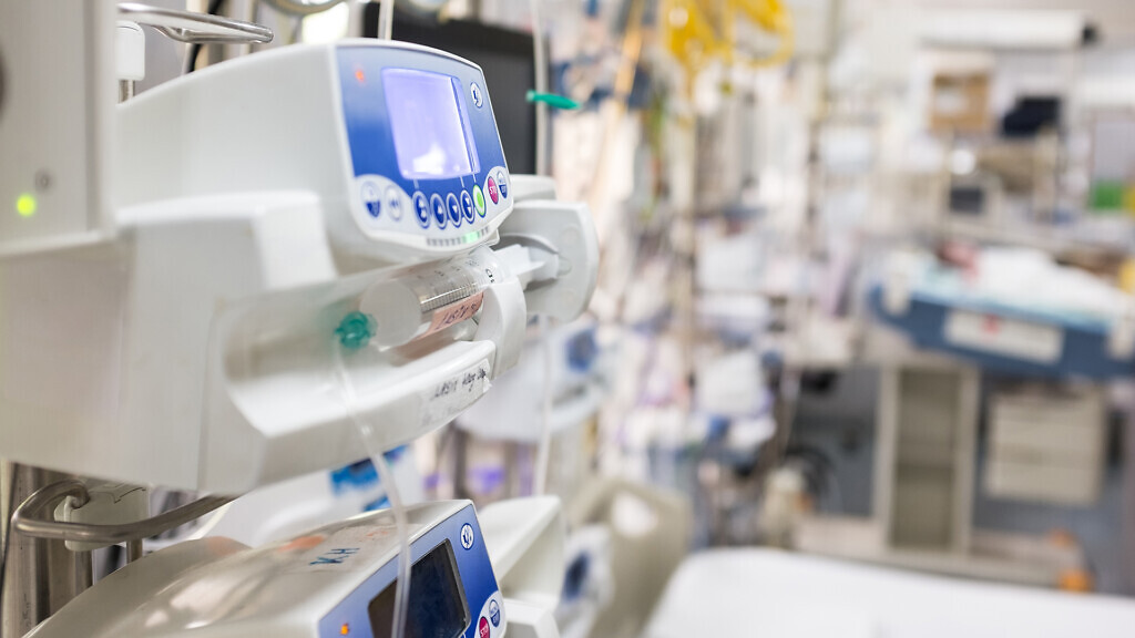 Medical device in UK NHS EMS ICU hospital room,infusion pump.