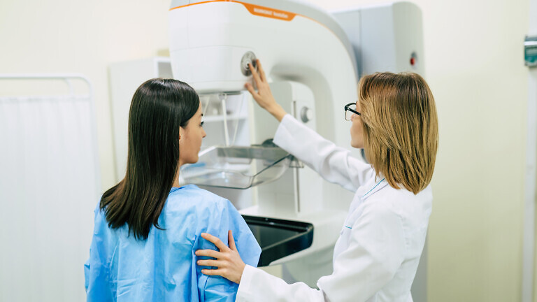 Young woman having mammography examination