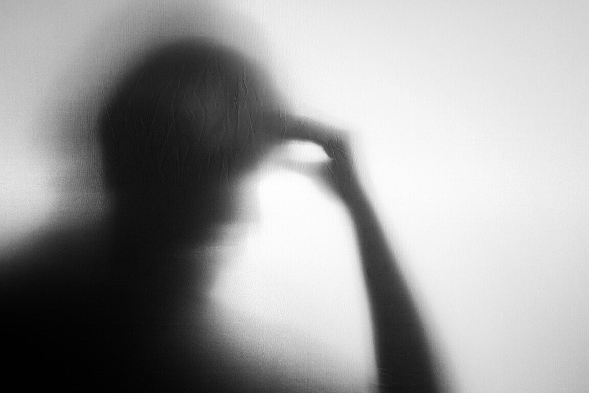 Silhouette of Senior Elderly Person who as Parkinson or Alzheimer Disease.