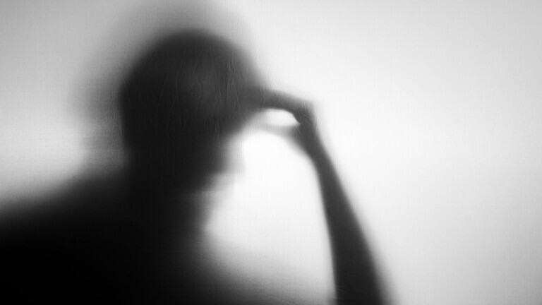 Silhouette of Senior Elderly Person who as Parkinson or Alzheimer Disease.