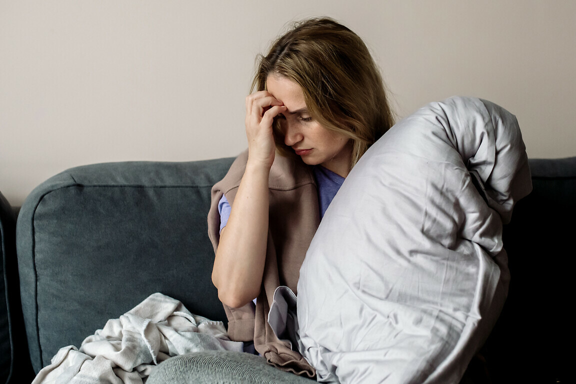 Young woman with long covid syndrome.