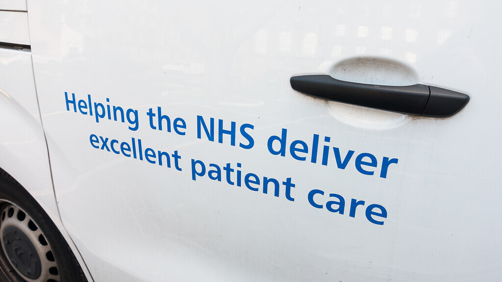 London, England, December 4th 2021: A NHS white van, sign readin