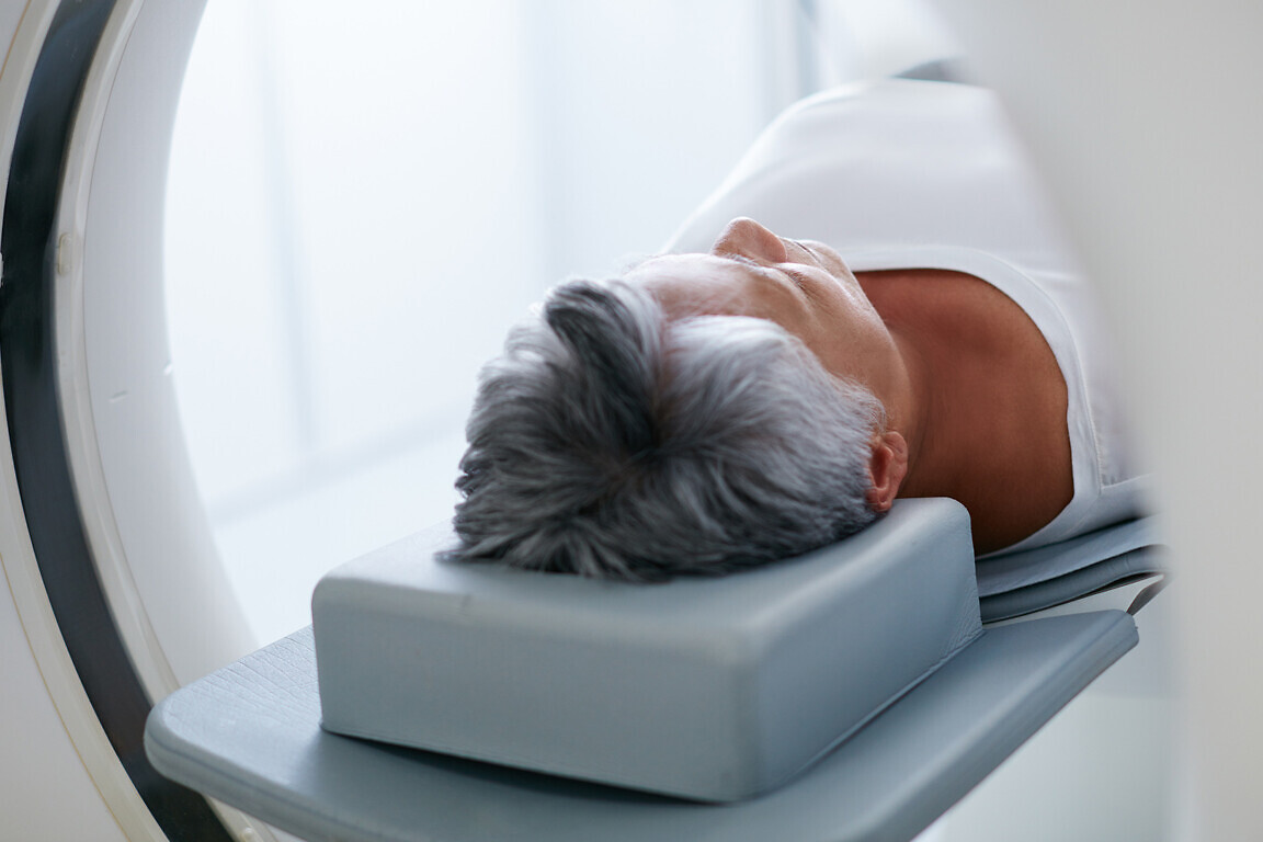 Shot of a senior woman about to have an MRI scan.