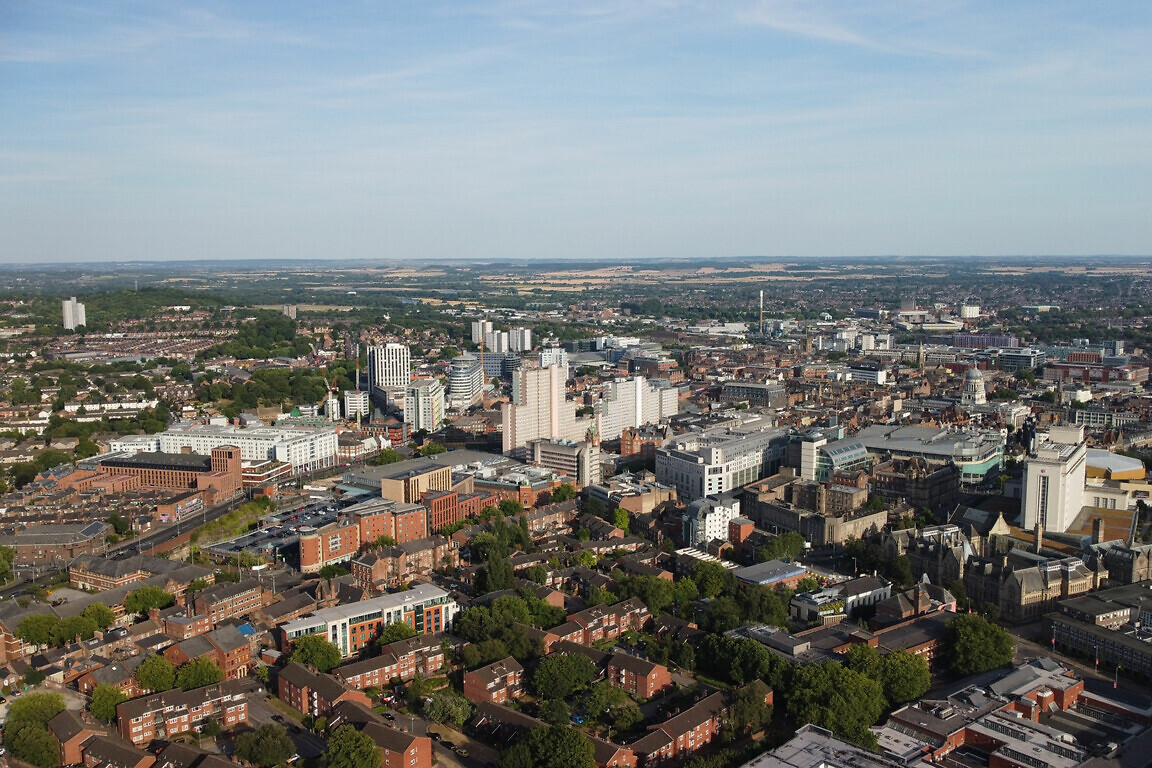 Aerial shot of the city streets with residential buildings
