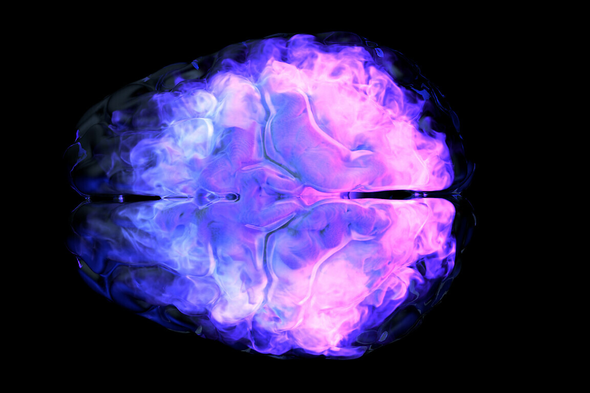 Human brain with abstract visualization of neuron activity.