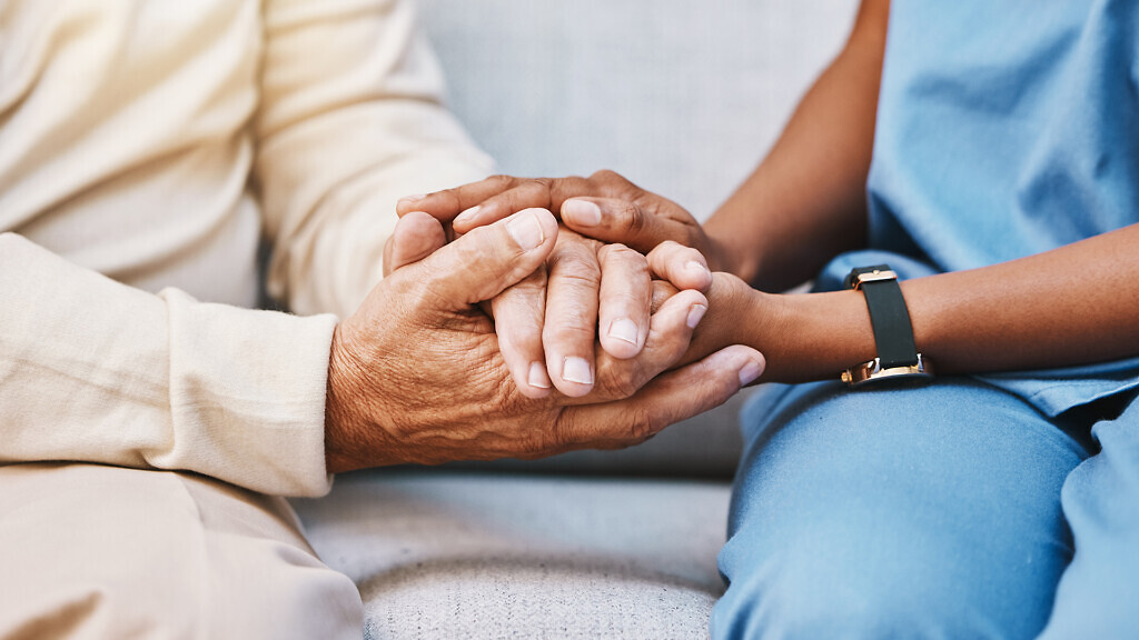 Nurse, hands and senior patient in empathy, safety and support of help, trust and healthcare consulting. Nursing home, counseling and gratitude for medical caregiver, client and hope in consultation