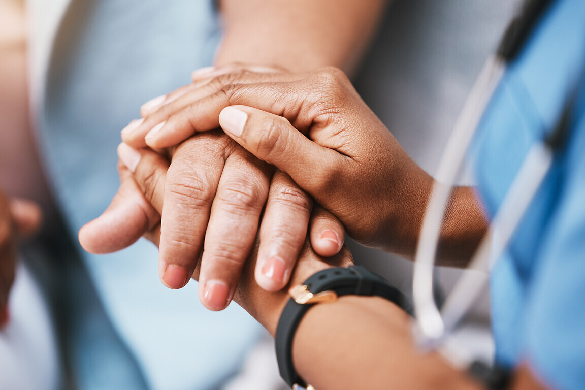 Empathy, trust and nurse holding hands with patient for help, consulting support and healthcare advice. Kindness, counseling and medical therapy in nursing home for hope, consultation and psychology