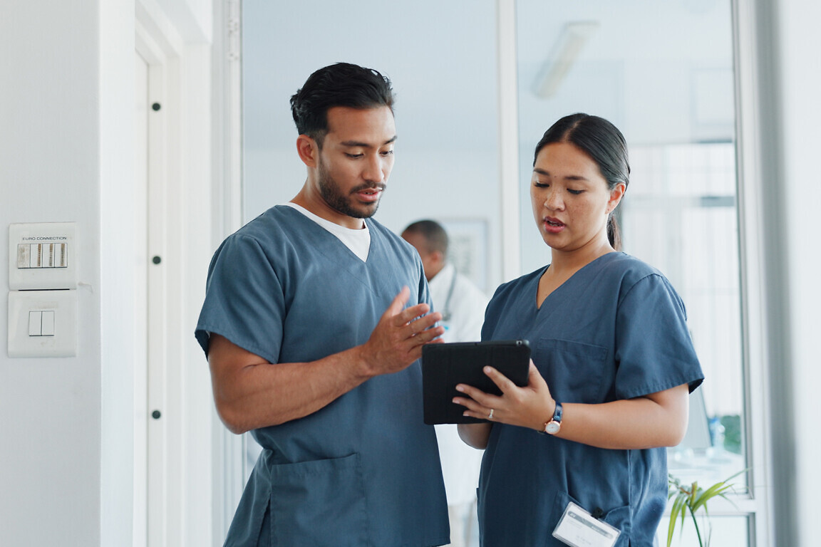 Medical advice, help and doctors with a tablet for healthcare, research and medicine planning. Communication, collaboration and men working in cardiology talking about surgery results on technology.