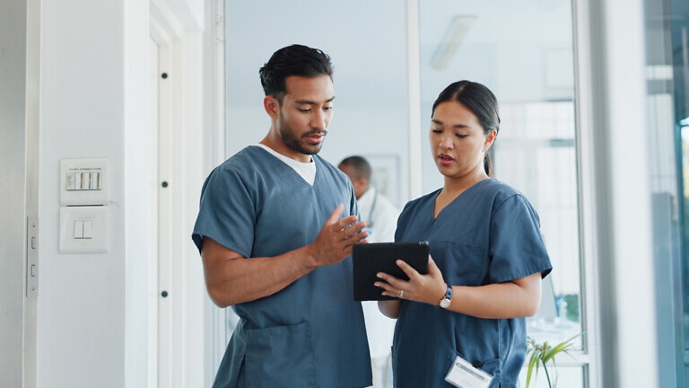 Medical advice, help and doctors with a tablet for healthcare, research and medicine planning. Communication, collaboration and men working in cardiology talking about surgery results on technology.