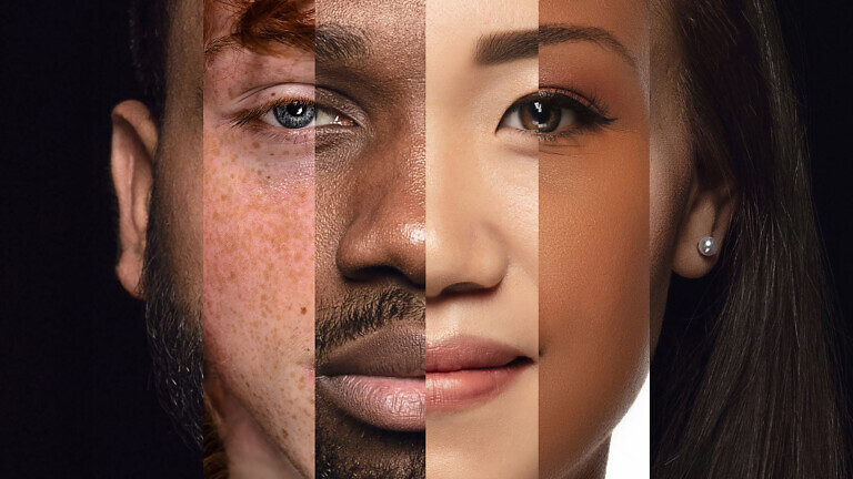 Human face made from different portrait of men and women of diverse age and race.