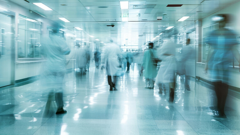 A motion blurred photograph of a hospital interior.