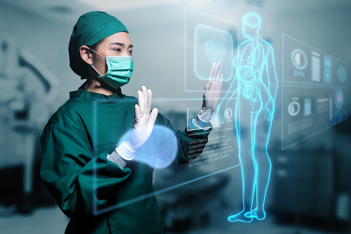 Asian female doctor specialist surgeon using computer human body