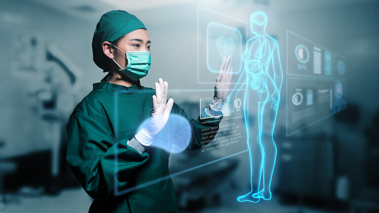 Asian female doctor specialist surgeon using computer human body
