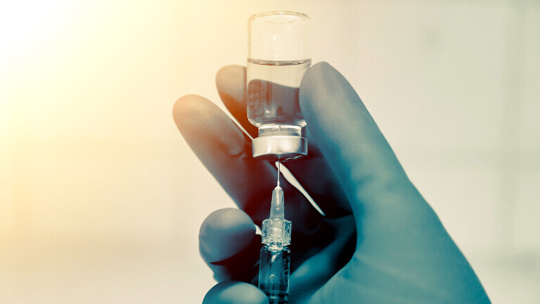 Medical hand glove blue molding vial vaccine hypodermic needle syringe injection treatment.Lab since test immunization and vaccination concept.drug insulin care prevention diabetes disease hospital.