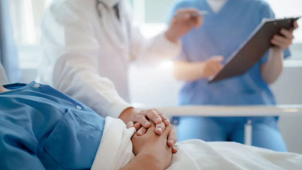 doctor talking with patient