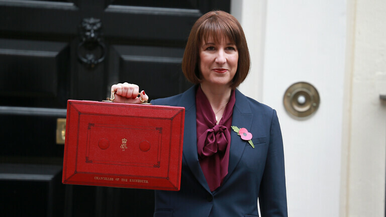 Rachel Reeves, chancellor of the exchequer, poses outside 11 Downing Street.